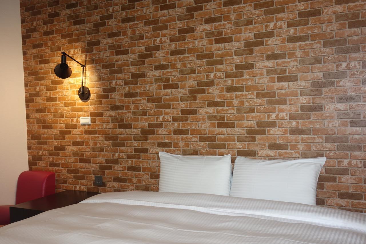 Xiu Shui Hotel Юйчи Экстерьер фото